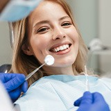 Closeup of woman smiling during dental checkup