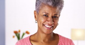 a close-up of a woman smiling