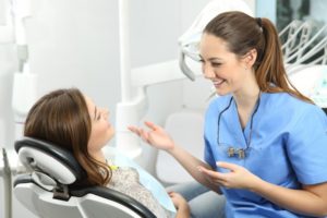 a dentist treating a patient