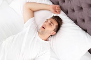 a man sleeping with mouth open