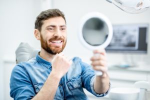 A man seeing himself in the mirror